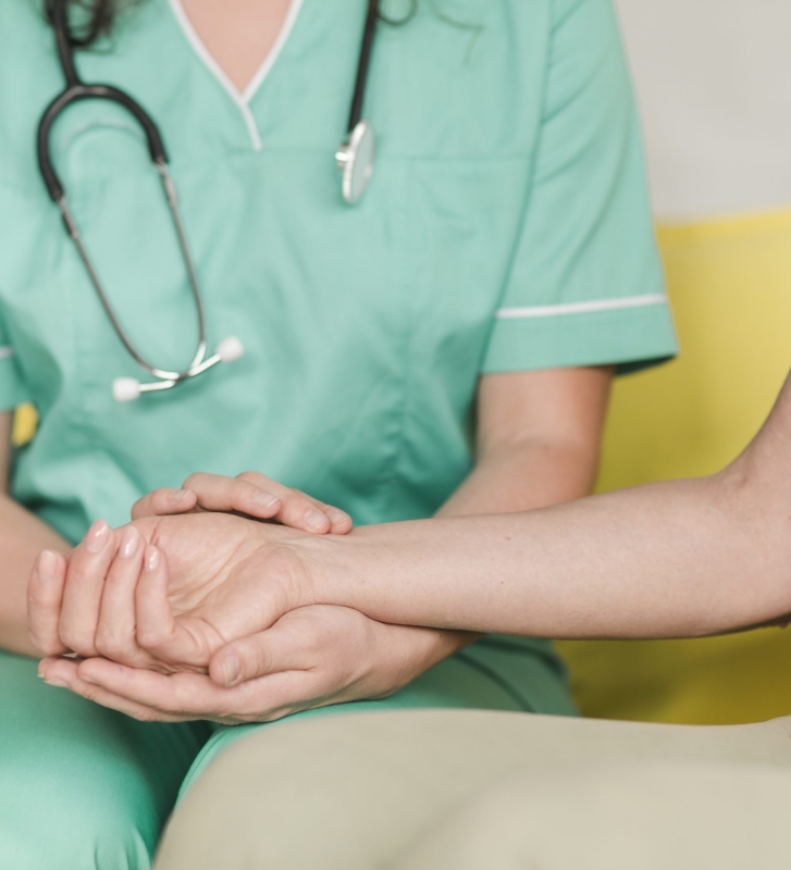 nurse-checking-pulse-female-patient-s-wrist